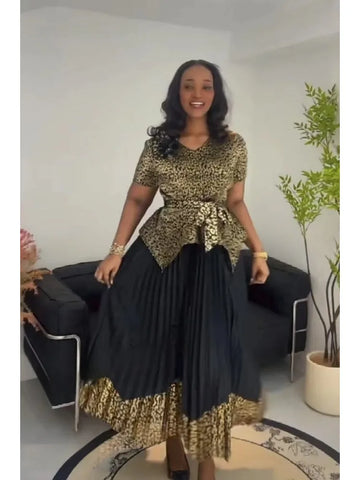 Image of 2025 Spring New Fashion Casual Suit Women's Bronzing Bud V-neck Top High Waist Long Skirt Two-piece Set-FrenzyAfricanFashion.com