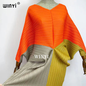 batwing pleated dress
