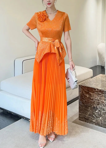 Image of 2025 Spring New Fashion Casual Suit Women's Bronzing Bud V-neck Top High Waist Long Skirt Two-piece Set-FrenzyAfricanFashion.com
